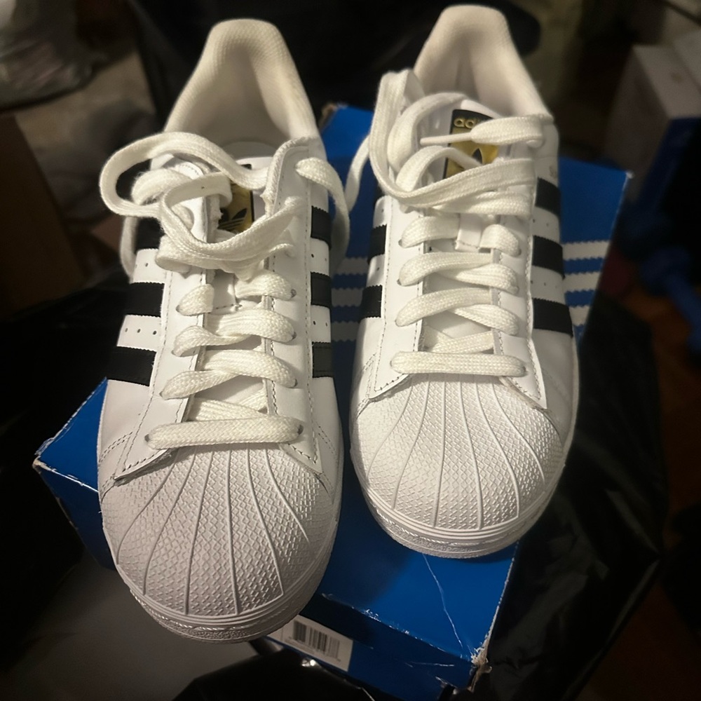 Adidas Women’s White and Black Shell Toe Sneakers